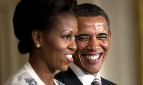 Usai Dilantik, Presiden Obama Ajak Istri Turun ke Jalan