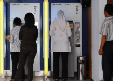 Nilai Transaksi di ATM Sepanjang 2012 Capai Rp 264,77 Triliun