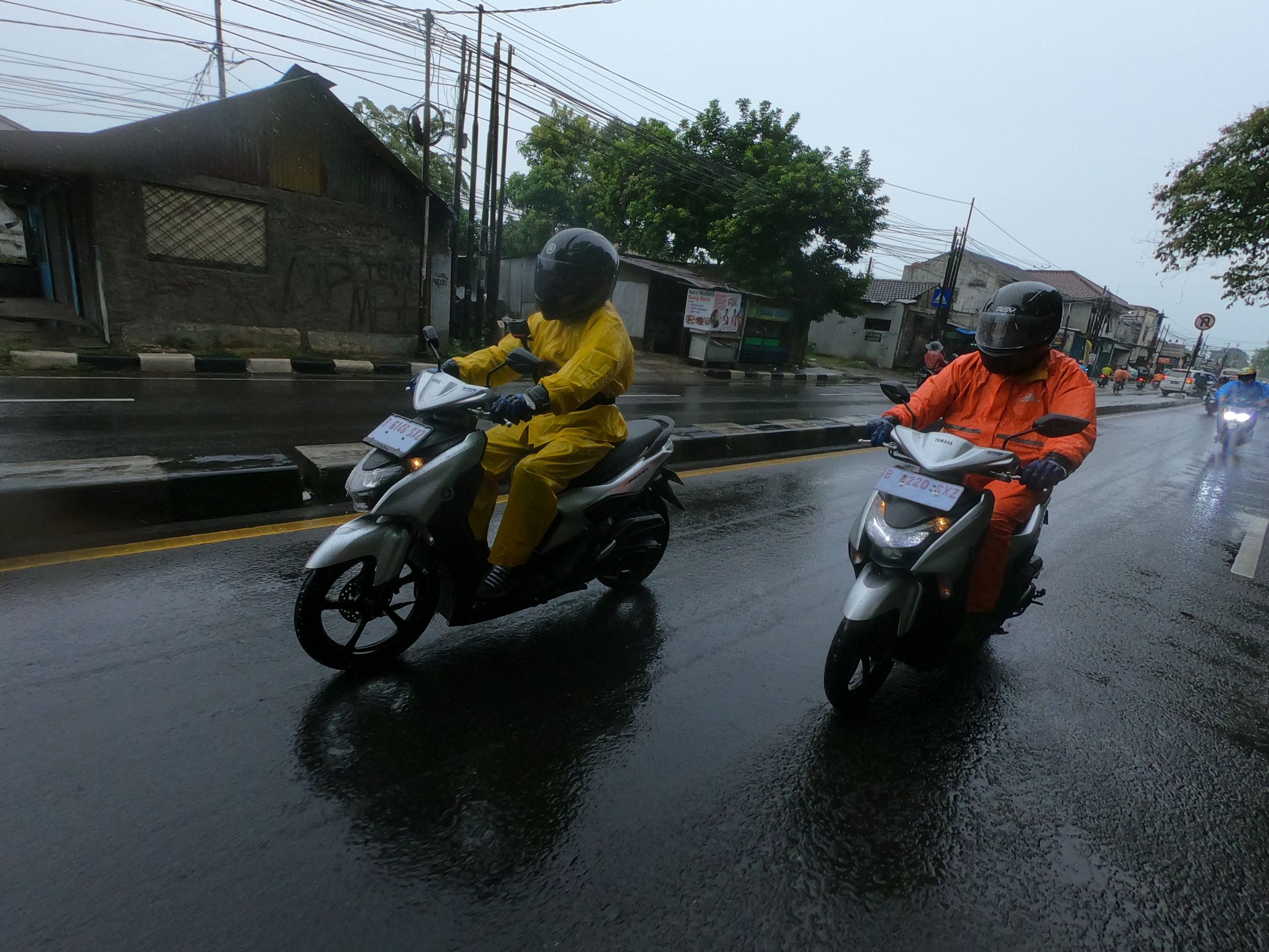Tips Berkendara Saat Hujan, Perhatikan Kondisi Tubuh dan Gaya Berkendara