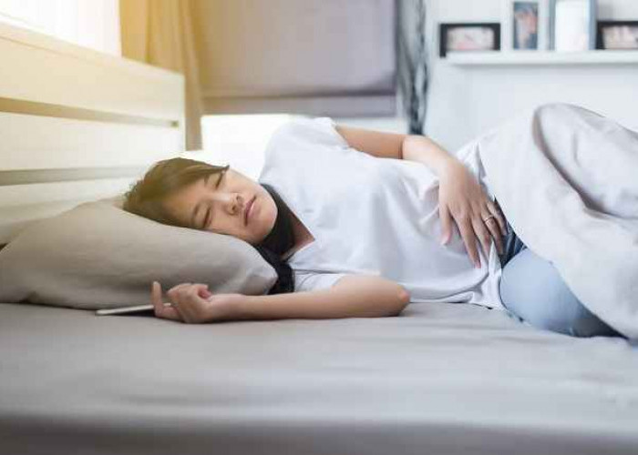 Ini Tips Mengatasi Susah Tidur Saat Menstruasi